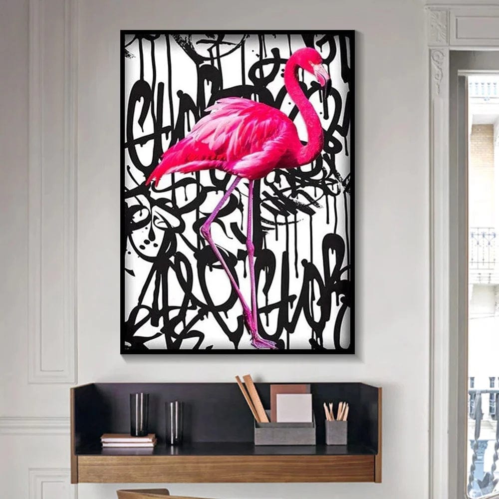 Graffiti flamingo wall art, vibrant pink bird portrait against a black and white urban street art background above a shelf