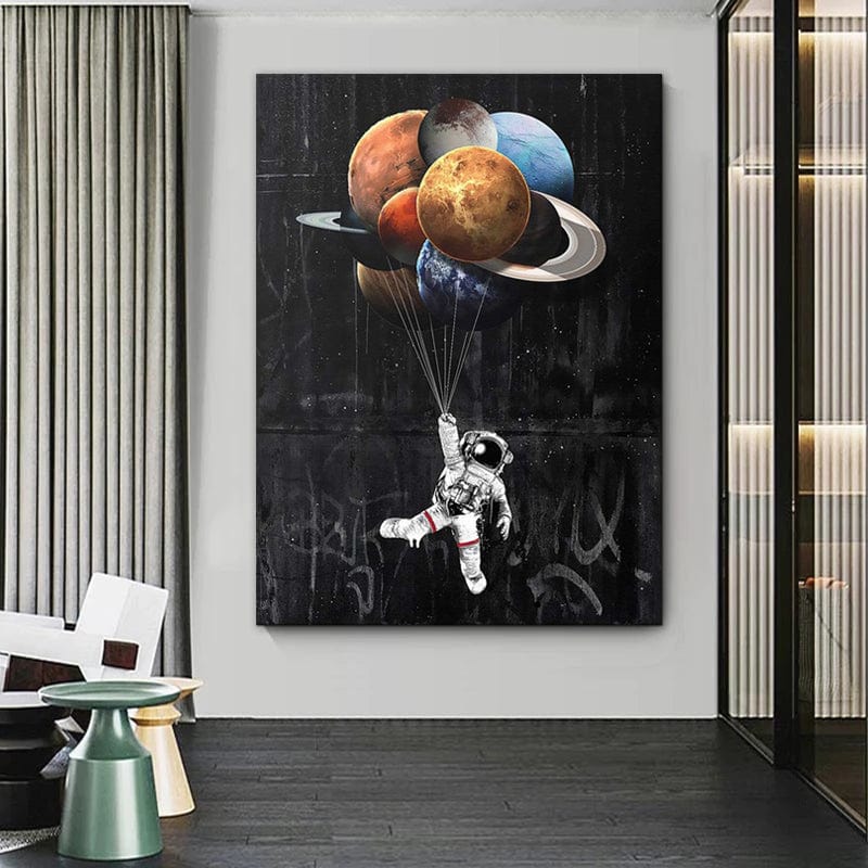 Astronaut and planets wall art, astronaut holding solar system planets like balloons in space