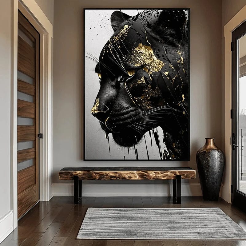 Black panther portrait wall art with gold leaf details, hanging in a modern hallway above a wooden bench