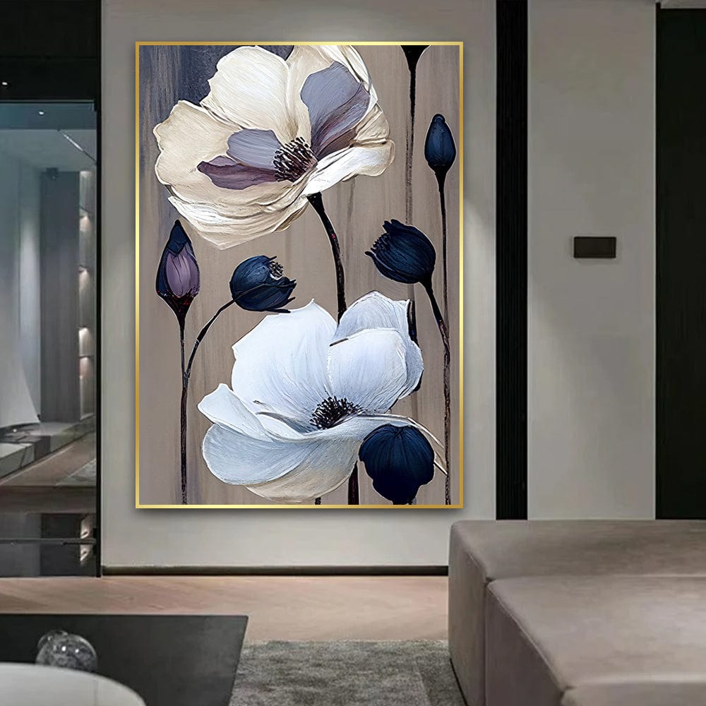 White and blue floral painting wall art, soft petals and dark buds in a slim gold frame in a modern living room