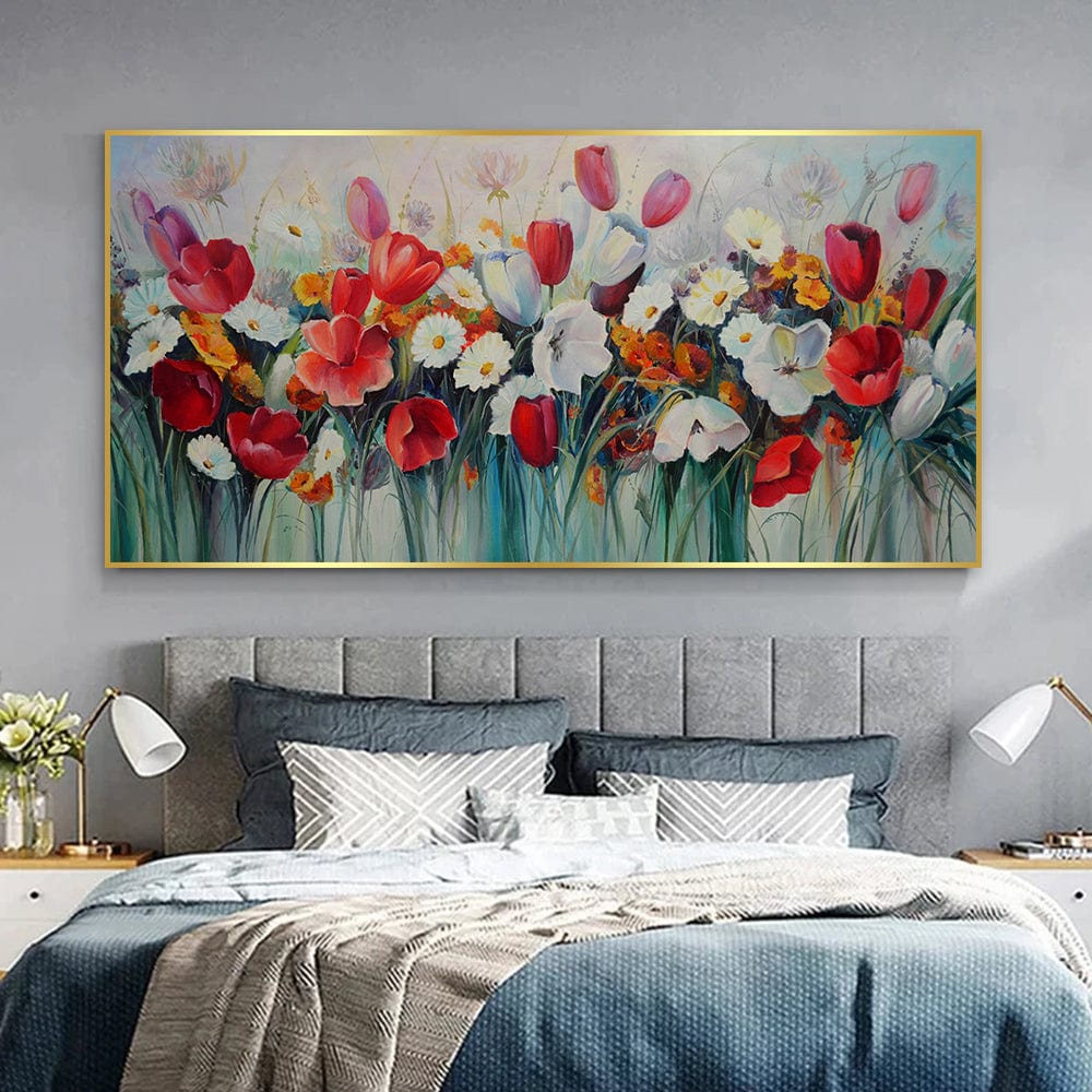Red and white floral landscape wall art, vibrant poppies and daisies in a gold frame above a bed