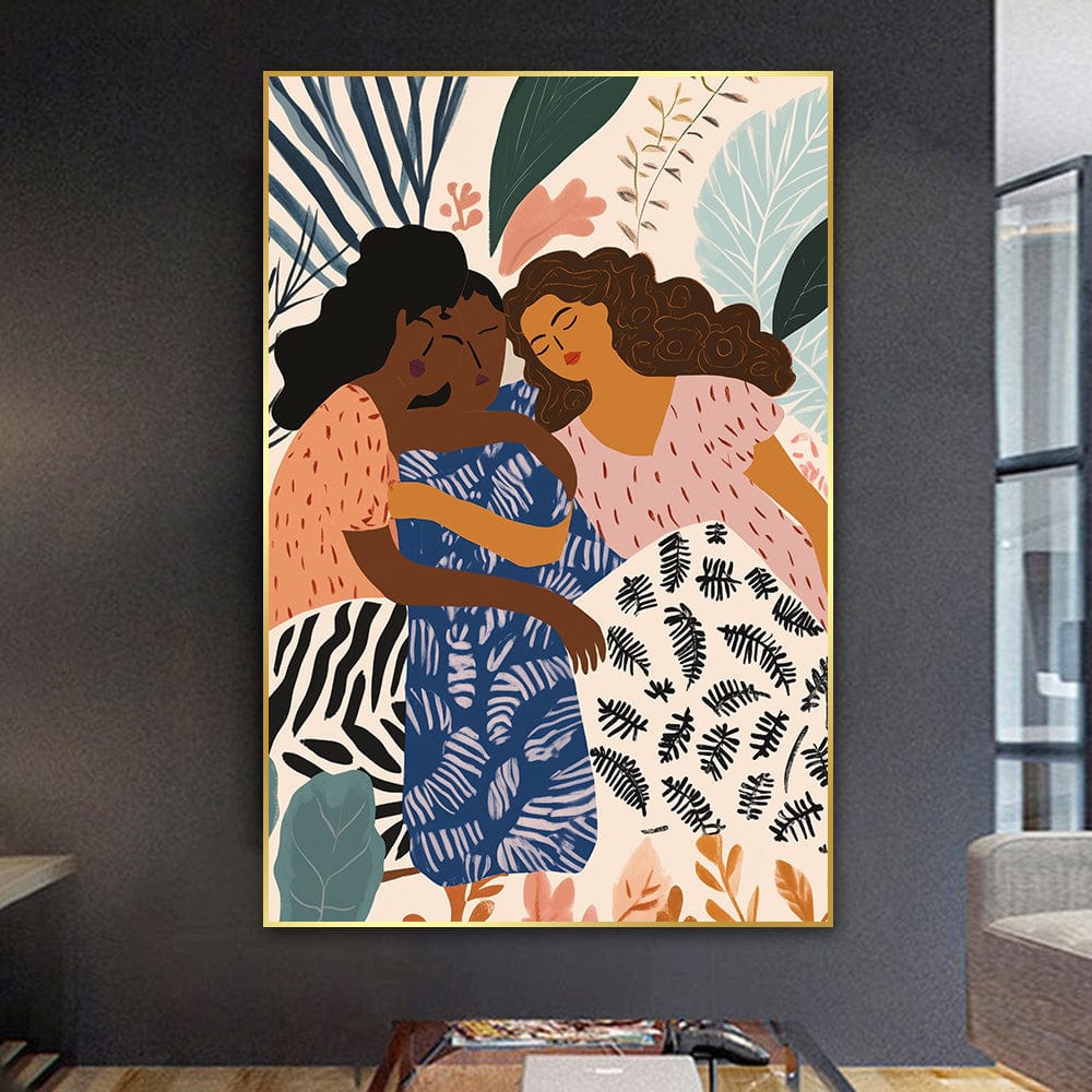 Two women hugging wall art, friends with dark curly hair embracing among leaves in blue, coral and cream, gold frame