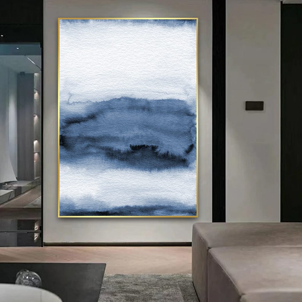 Abstract blue landscape wall art, watercolor washes in soft blue and white creating a distant horizon in a thin gold frame