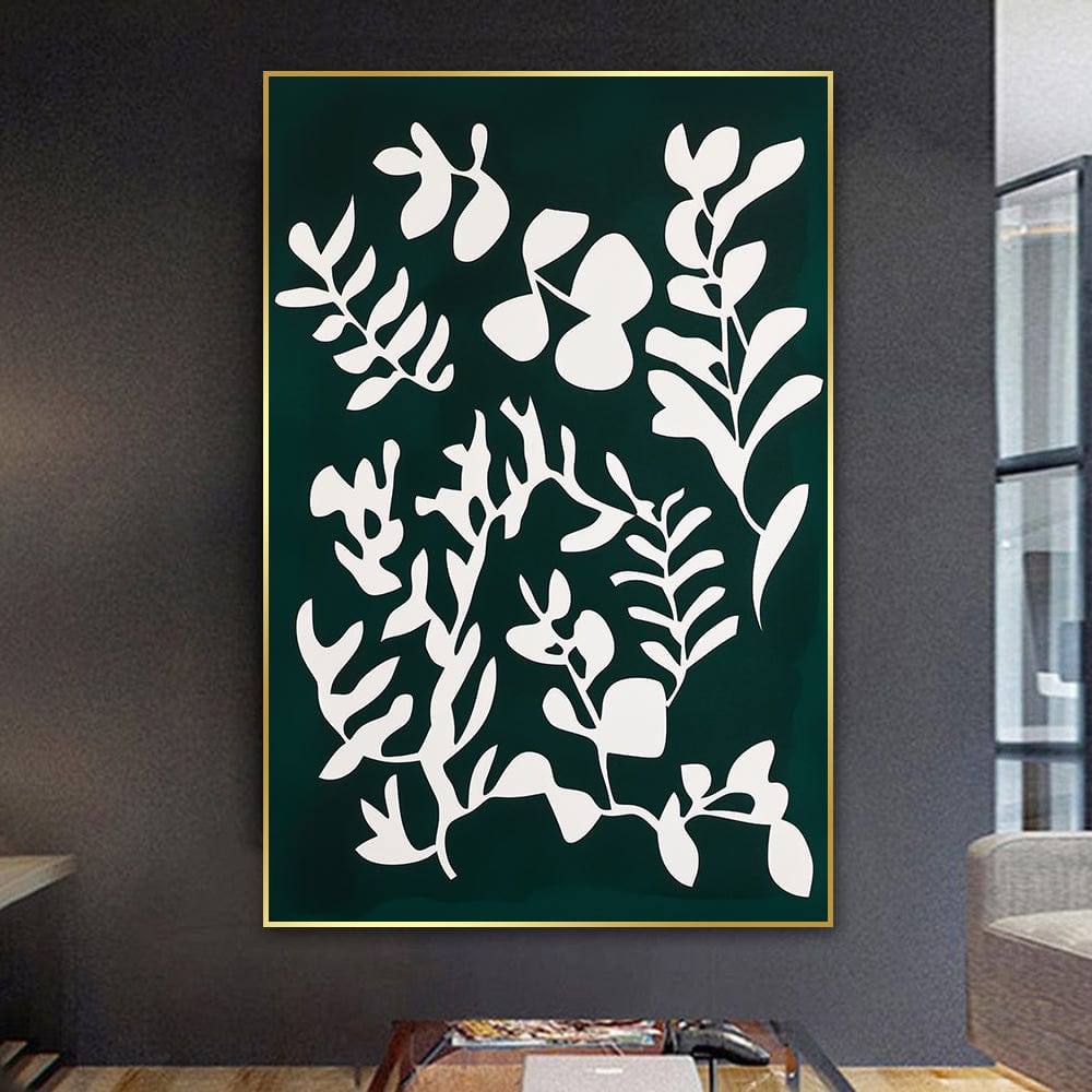 Abstract botanical wall art, white plant silhouettes on a dark green background in a thin gold frame