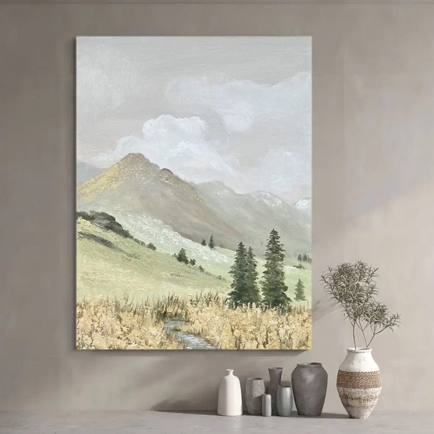 Serene mountain landscape wall art, peaceful peaks and evergreen trees above a grassy glade in soft green and beige