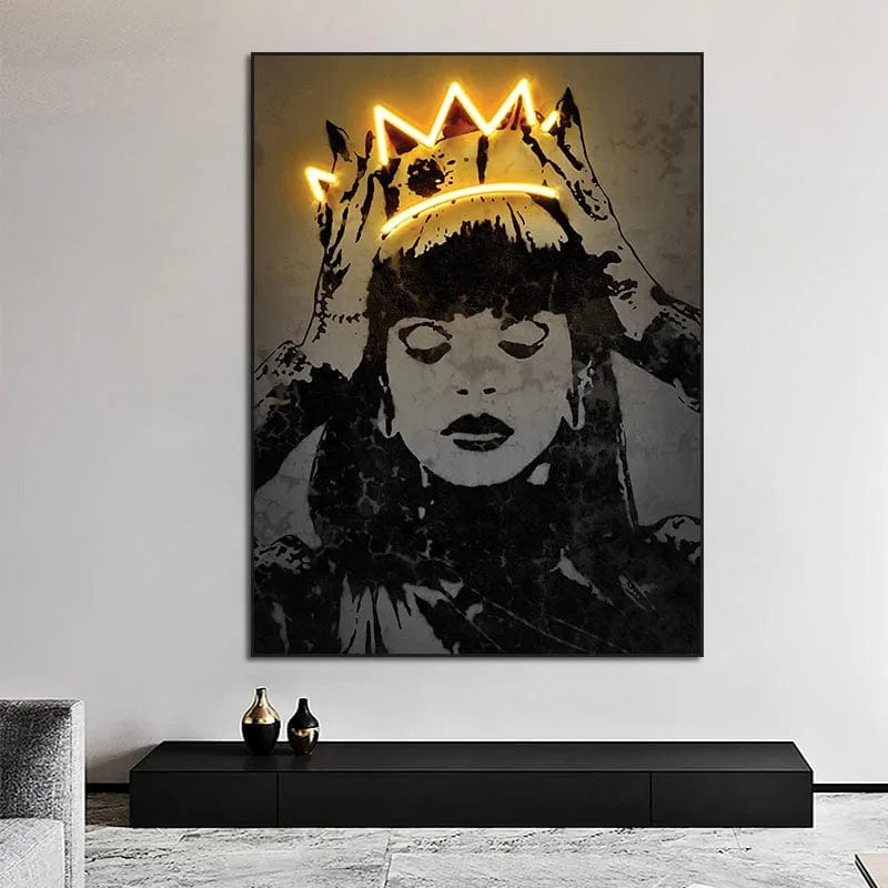 Black and gold woman wall art, stencil style portrait with closed eyes and a glowing yellow crown on her head