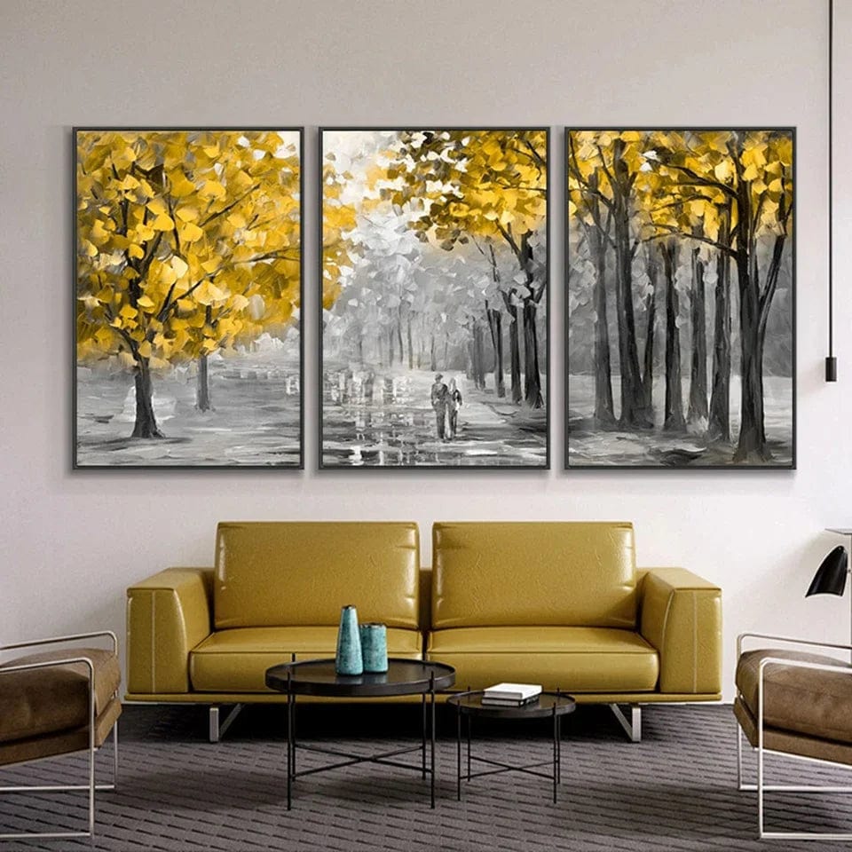 Timeless Path wall art trio, grey and yellow abstract painting of autumn trees and a couple walking above a yellow sofa