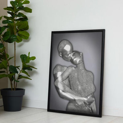 Framed artwork of a stylized human figure on a white wall with a plant and green cabinet.