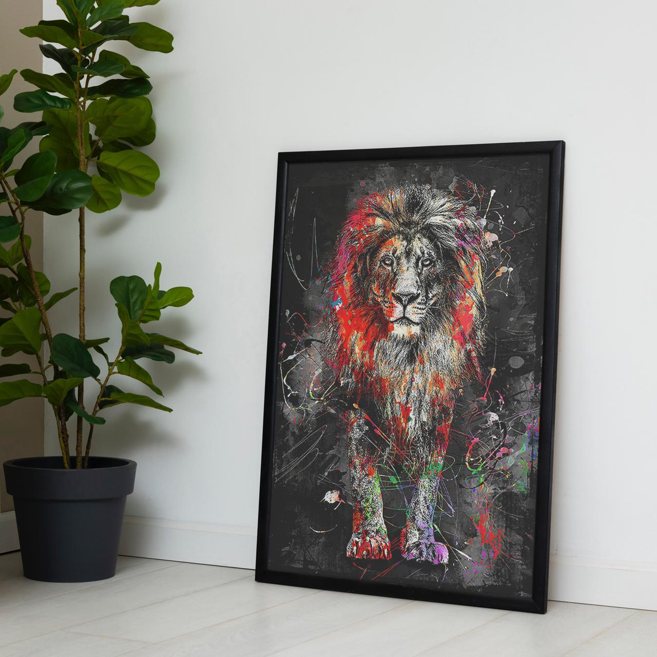 Framed colorful lion painting on a white wall with a plant to the left.