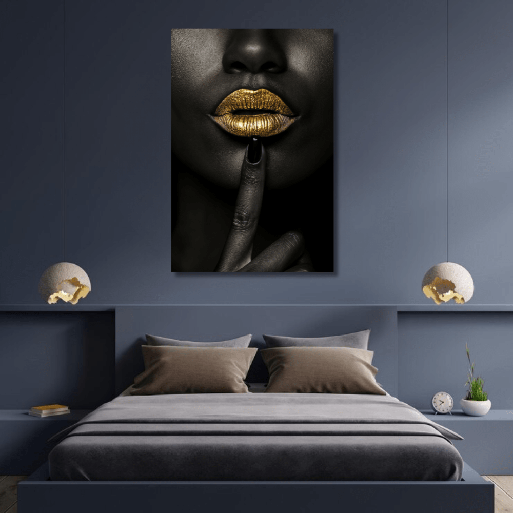 Black woman portrait wall art, close-up of a woman with metallic gold lips and a finger to her mouth in a dark mood