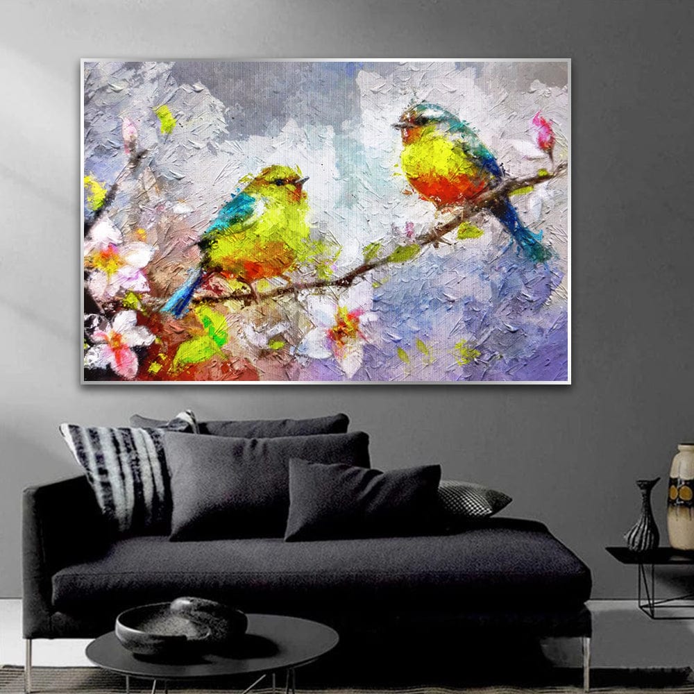 Colorful bird landscape painting wall art, two yellow and blue birds on a blooming branch above a black sofa