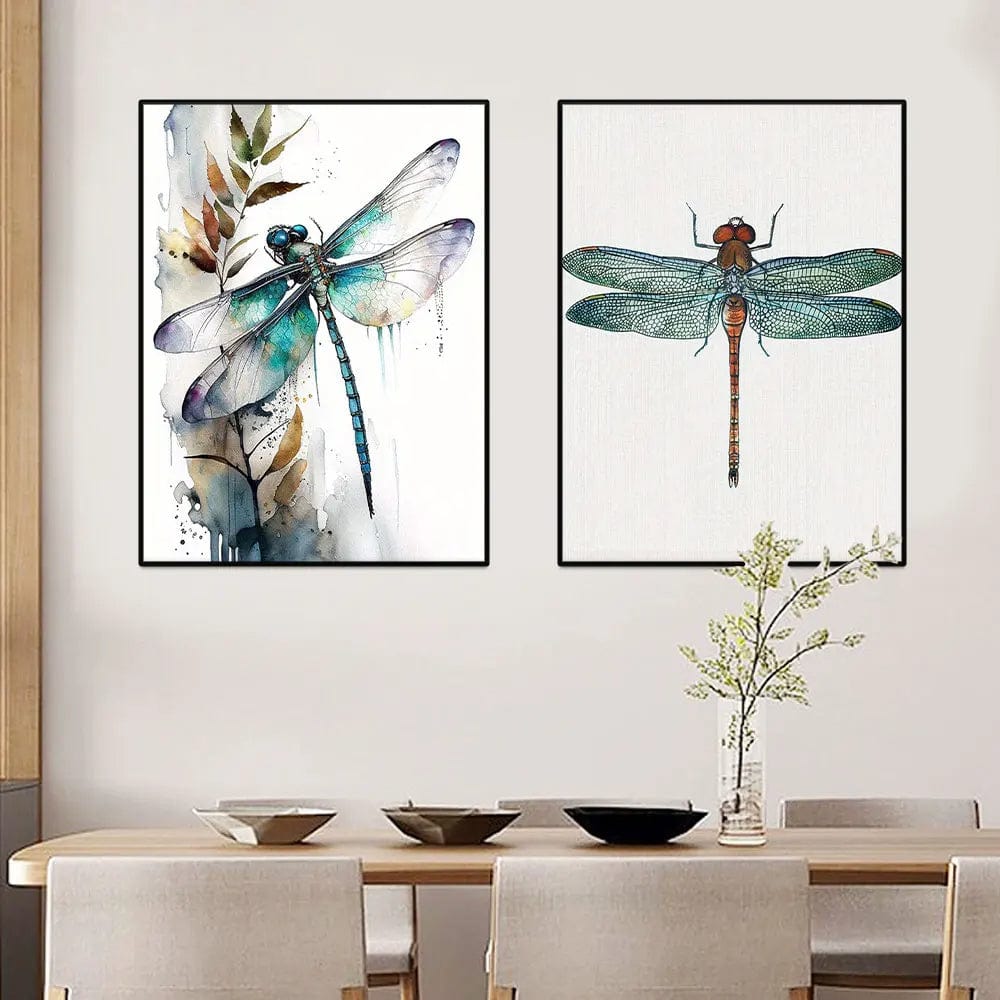 Watercolor dragonfly wall art, blue insect painting with delicate foliage in black frames above a dining table