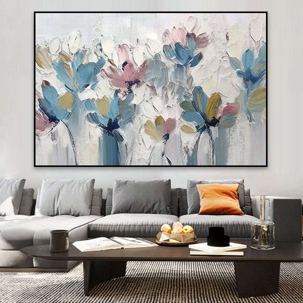 Contemporary fleurs floral landscape wall art, textured blue and pink flowers on a light background in a black frame