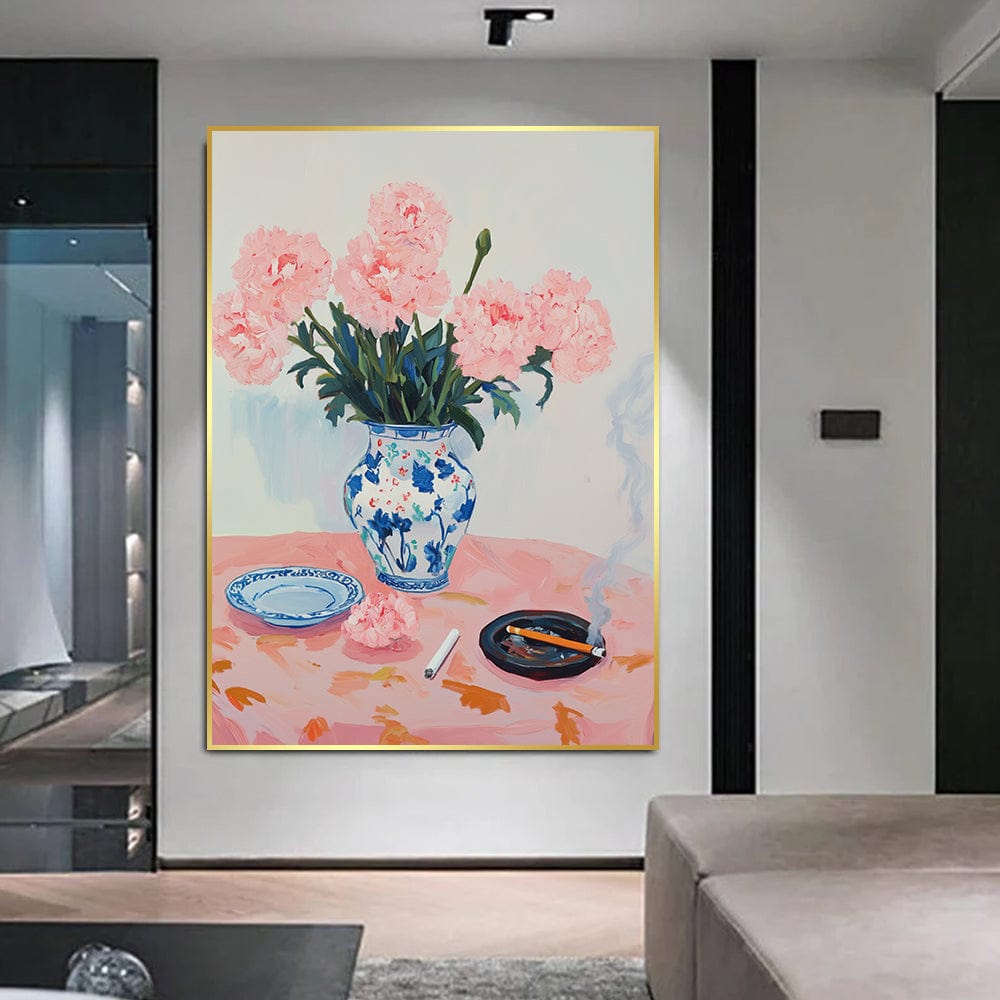 Pink floral still life wall art, pink blooms in a blue and white vase with a cigarette on a pastel table in a room