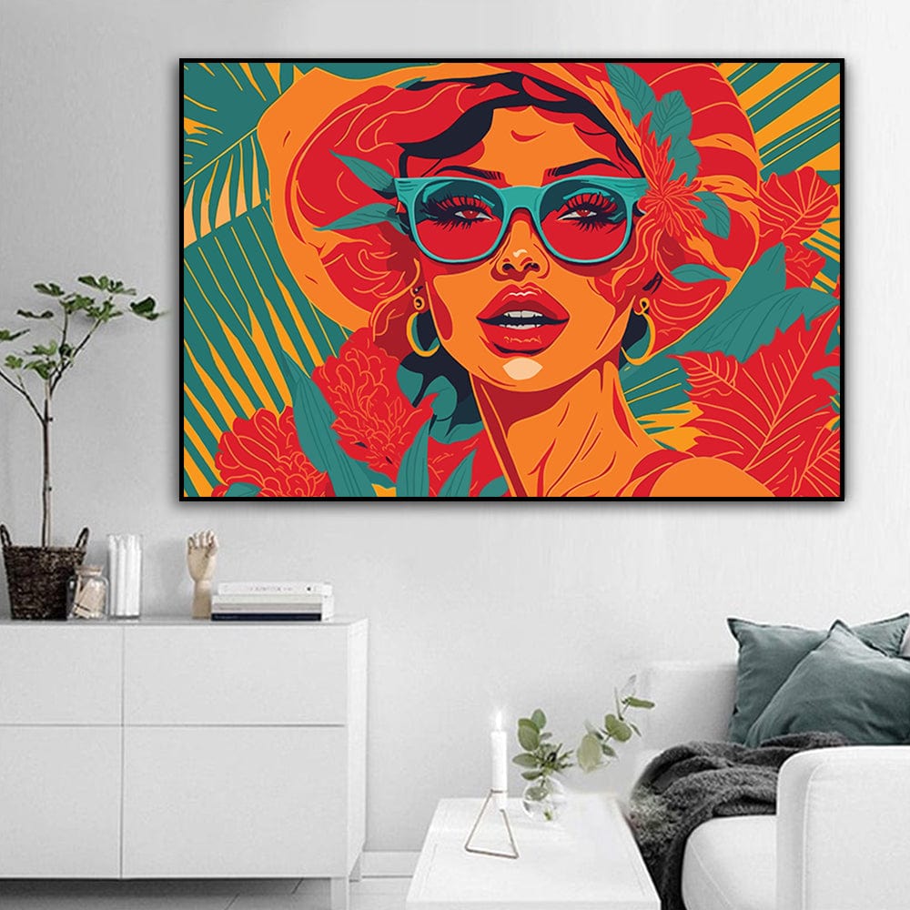 Pop art woman wall art, retro woman in teal sunglasses and a red sun hat with tropical leaves, black frame in a living room
