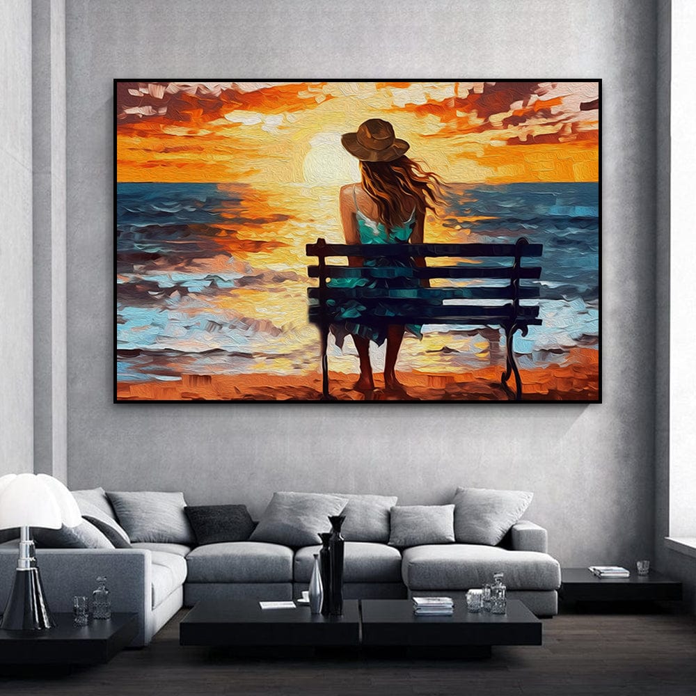 Sunset landscape painting wall art, woman in a hat on a bench looking at the ocean during a golden sunset