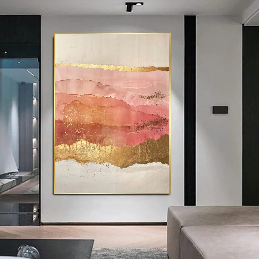 Abstract pink and gold landscape wall art, coral layers with gold leaf strokes hanging above a sofa