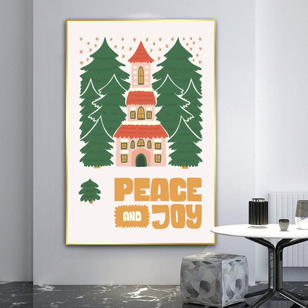 Holiday house and trees wall art, festive pink building surrounded by green pines and yellow text reading peace and joy