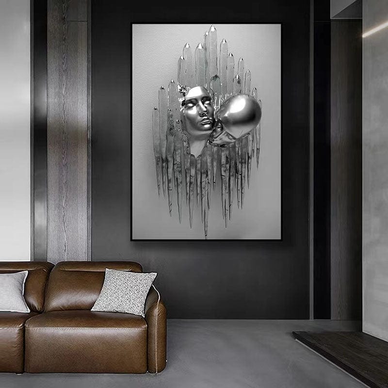 Through wall art, silver chromatic steel heads kissing emerging from a solid wall above a brown leather sofa