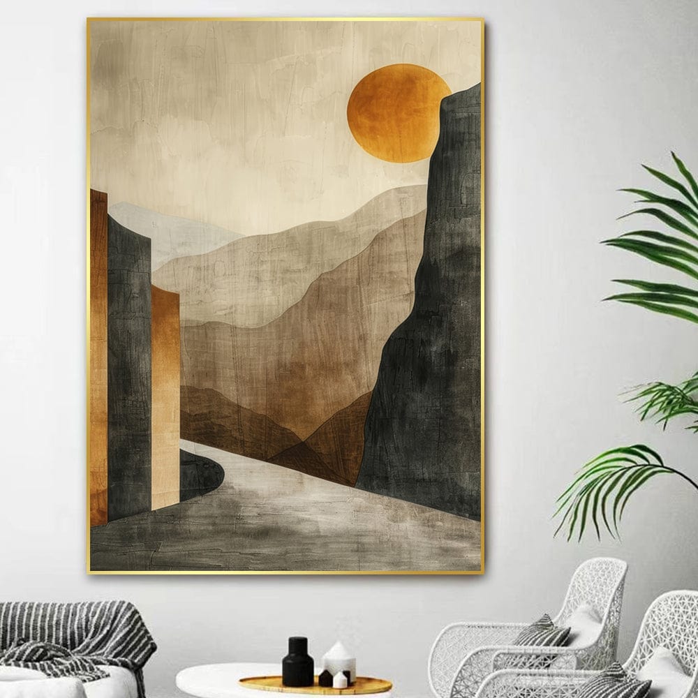 Gold framed abstract mountain landscape wall art in a modern living room above a sofa