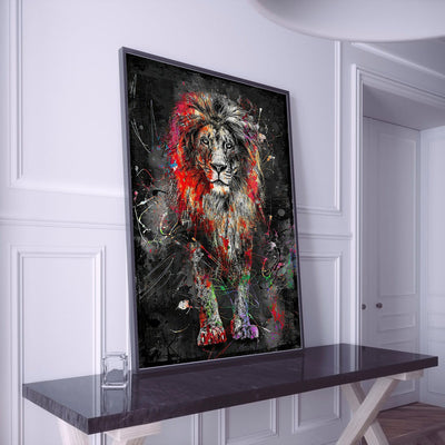 Framed abstract lion painting on a wall in a room with white paneling.