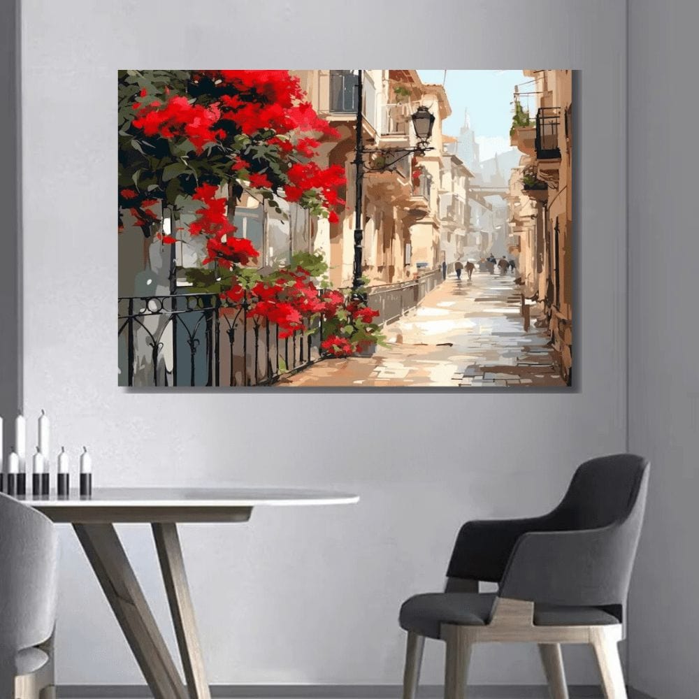 Parisian alley landscape wall art, painting of a rainy street with vibrant red flowers on a balcony and buildings