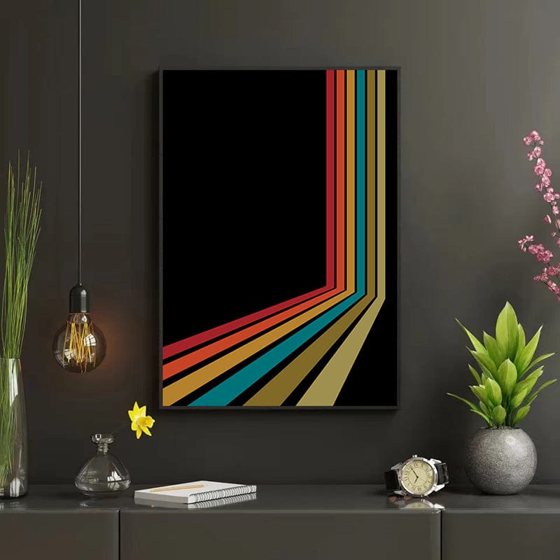 Retro abstract lines wall art, vibrant vintage stripes on a black background in a black frame on a console table