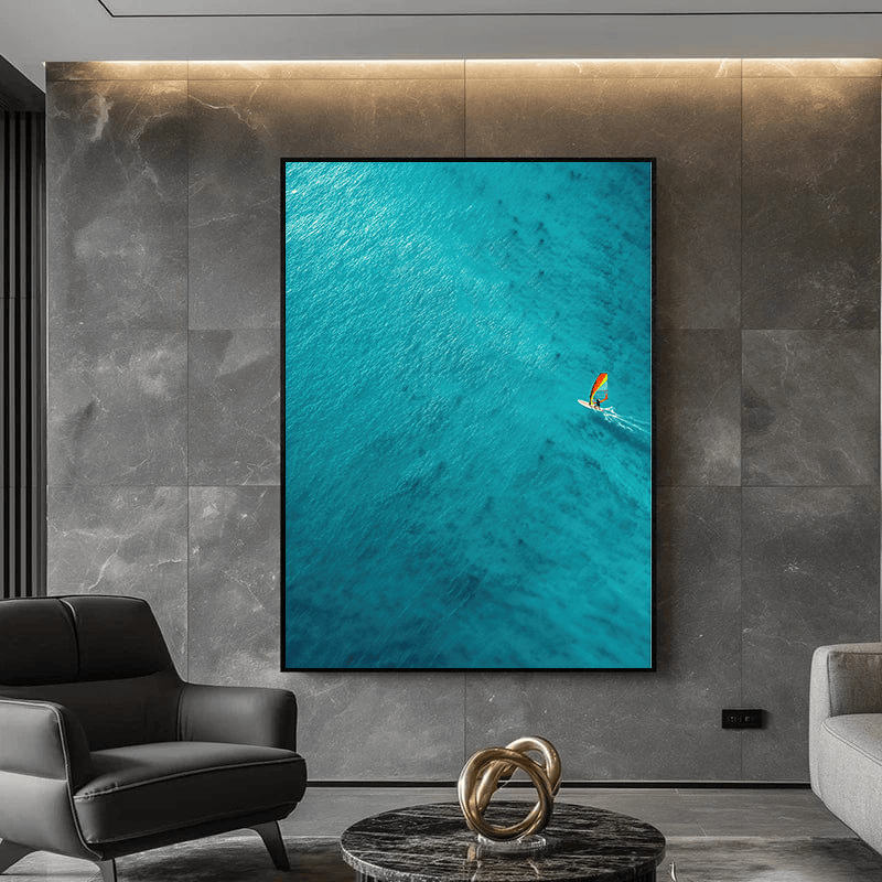 Turquoise water landscape wall art, aerial view of blue ocean with a tiny windsurfer and colorful sail