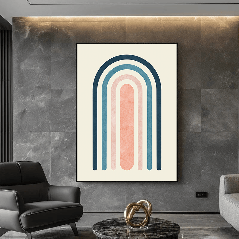 Abstract geometric rainbow wall art, minimalist arch print with navy, teal, blush, and coral tones on a dark stone wall