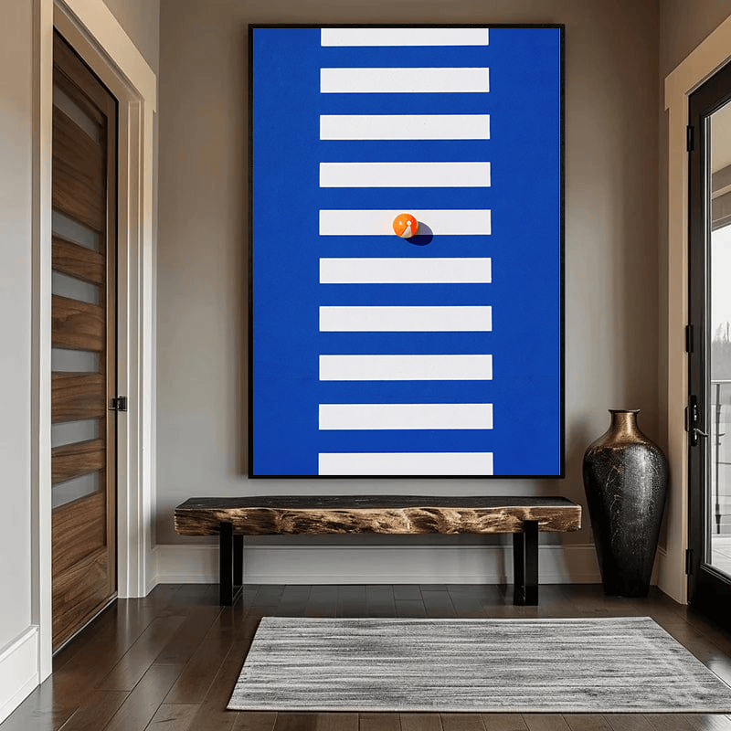 Minimalist blue and white wall art print, horizontal lines and an orange sphere with shadow on a solid blue background