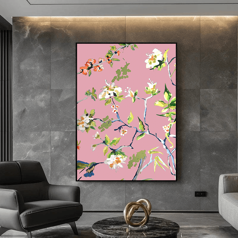 Pink botanical floral branch wall art, white blossoms and green foliage on a blush background in a black frame