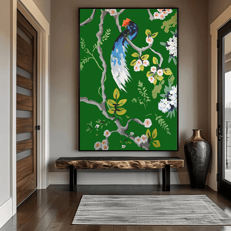 Botanical bird wall art, blue and white bird resting on green branches with white blossoms in an entryway