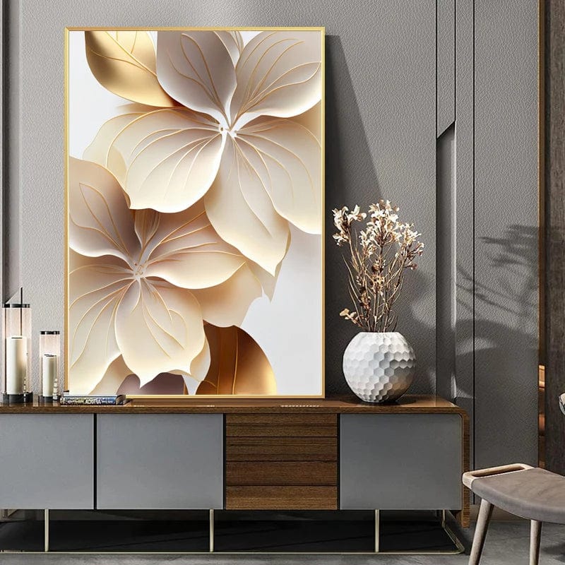 Abstract floral petal wall art, soft gold and ivory layered flowers in a gold frame above a credenza with a vase