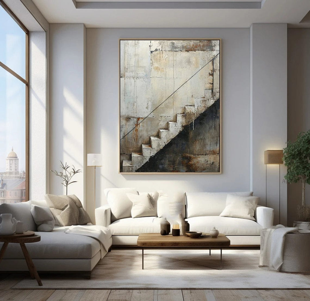 Industrial urban decay wall art, worn concrete staircase with rust tones and cracked walls in a wood frame above a sofa