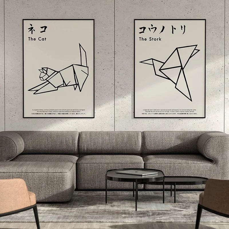Origami lines minimalist animal wall art, black cat and stork prints above a grey sofa