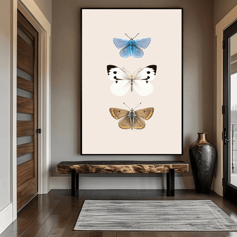 English butterflies wall art, minimalist print of three butterfly specimens on a neutral beige background in an entryway