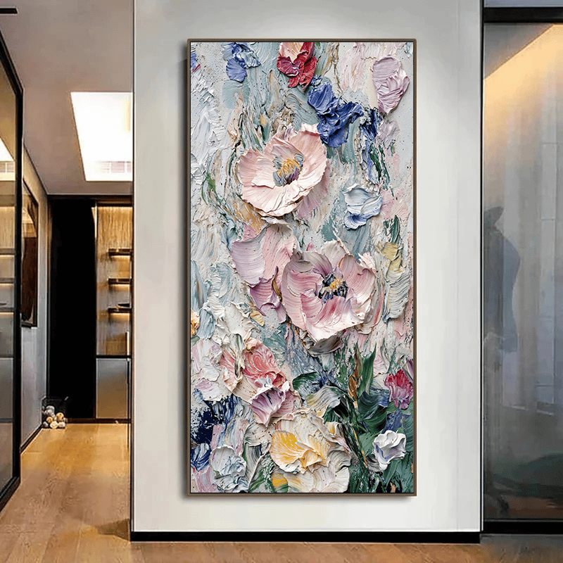 Textured floral wall art, vertical painting with pink and blue impasto blooms hanging on a white wall in a hallway