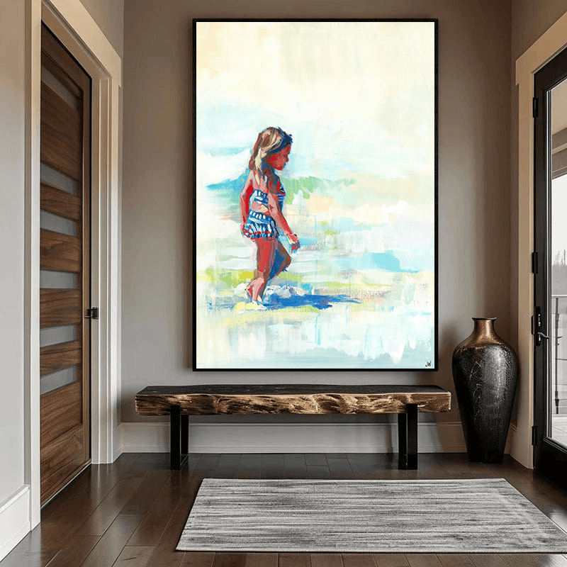 Izzie s Beach Day wall art print, coastal scene with a girl walking along the shoreline in blue and coral tones