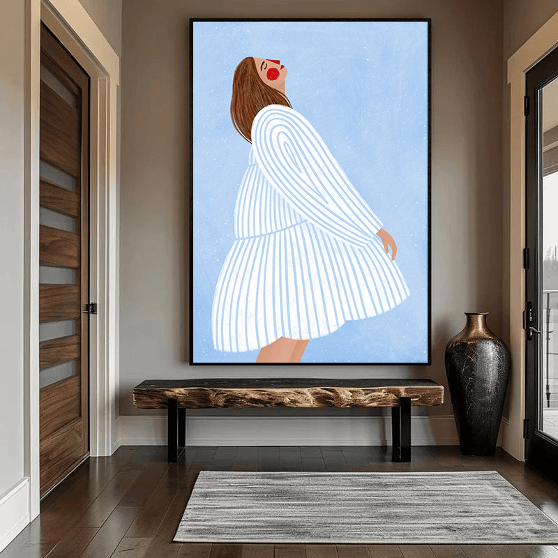Joyful Woman Blue Stripes wall art, stylized female portrait in a blue and white striped dress hanging in an entryway