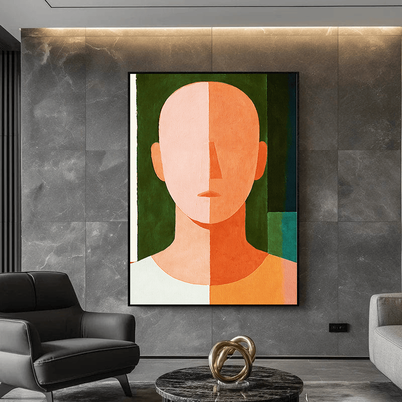 Abstract geometric portrait wall art, orange and peach figure in a black frame on a marble console table in a living room