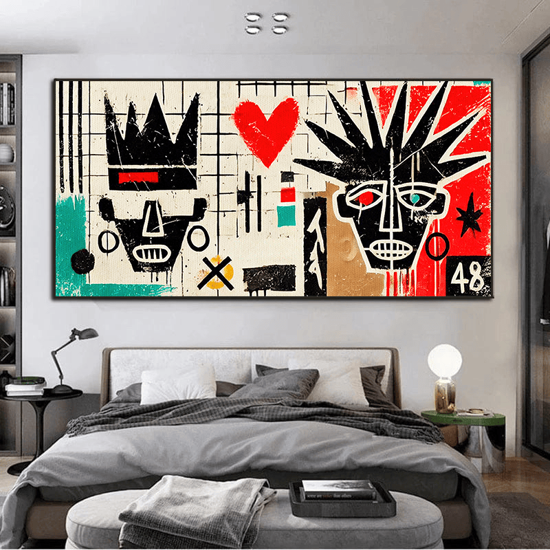 Abstract graffiti faces wall art, bold mixed media painting with a red heart and crown forms above a bed