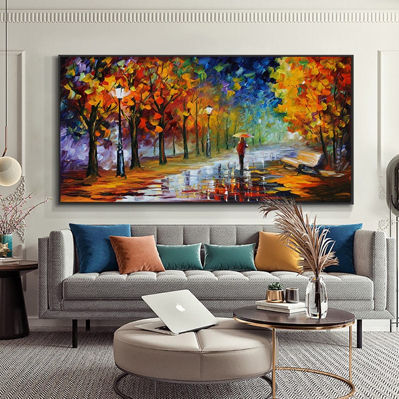 Blue and orange park landscape wall art, solitary figure walking with an umbrella under glowing street lamps in autumn