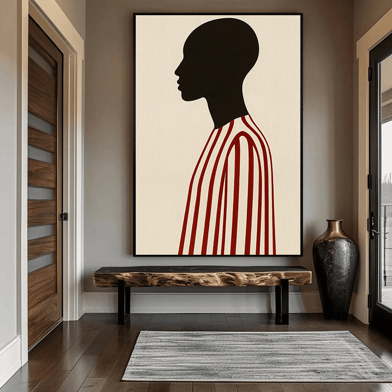 Minimalist portrait wall art, dark silhouette profile figure in a red and cream striped garment against neutral background