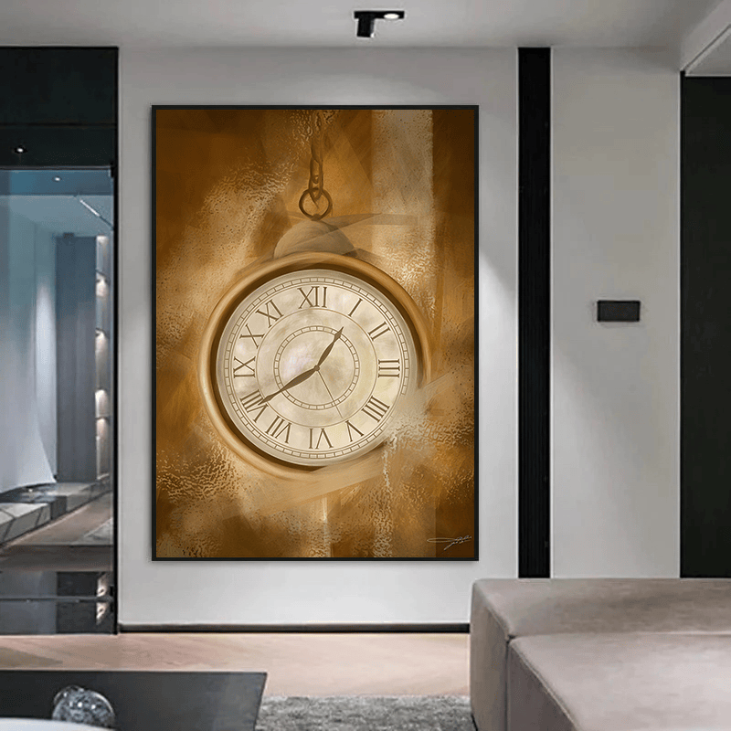 Sepia toned pocket watch wall art print in a black frame on a white wall in a contemporary hallway