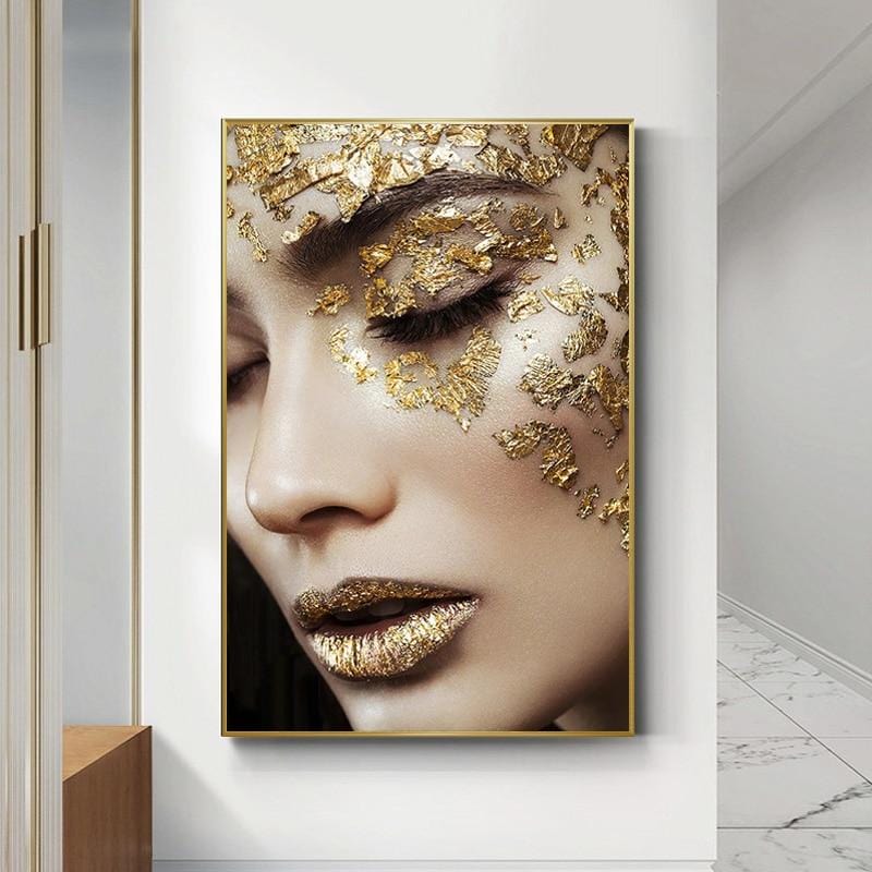 Gold leaf woman portrait wall art, close up of a female face with gilded lips and forehead in a thin frame