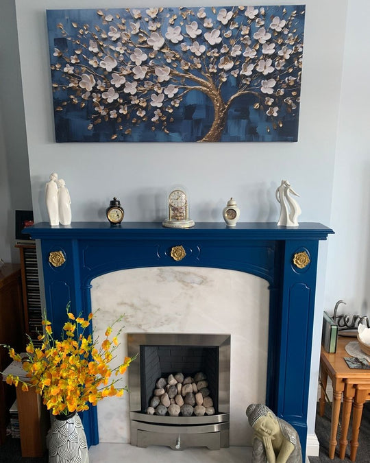 Blossom Azure canvas above a blue painted fireplace
