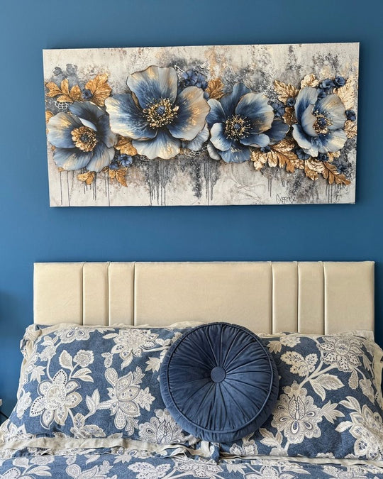 Mystic Blues canvas above a bed on a dark blue bedroom wall