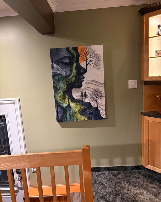 Gaia canvas on an olive green wall above a wooden banister